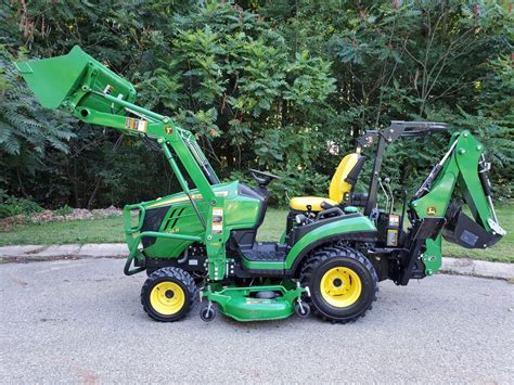 I find that <strong>John Deere</strong>'s specs and real world are often different (example my 200cx will pick up way more than the 600 odd pounds it's rated to). . Used backhoe attachment for john deere 1025r